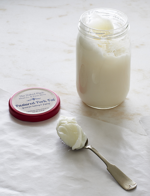 Jar of cooking lard with a spoon is food photography by Alison Gootee Photography