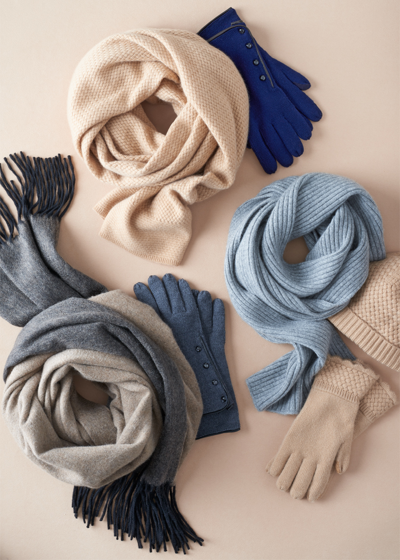 group of scarves coiled on beige background by Alison Gootee Photography 