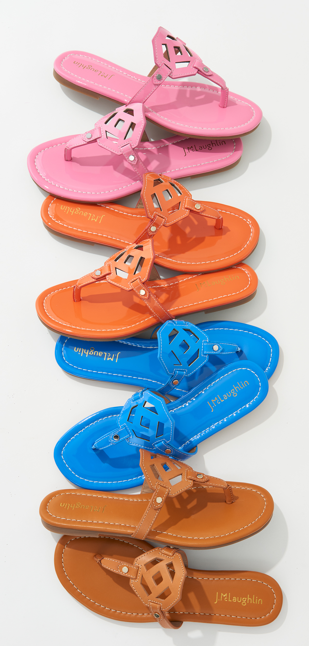  colorful sandals on white background by Alison Gootee Photography 