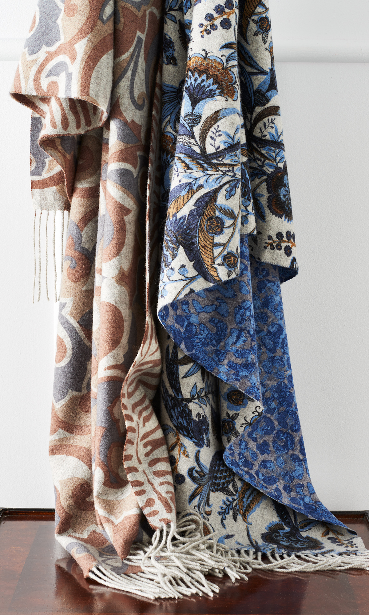 patterned scarves on the back of a chair by Alison Gootee Photography 