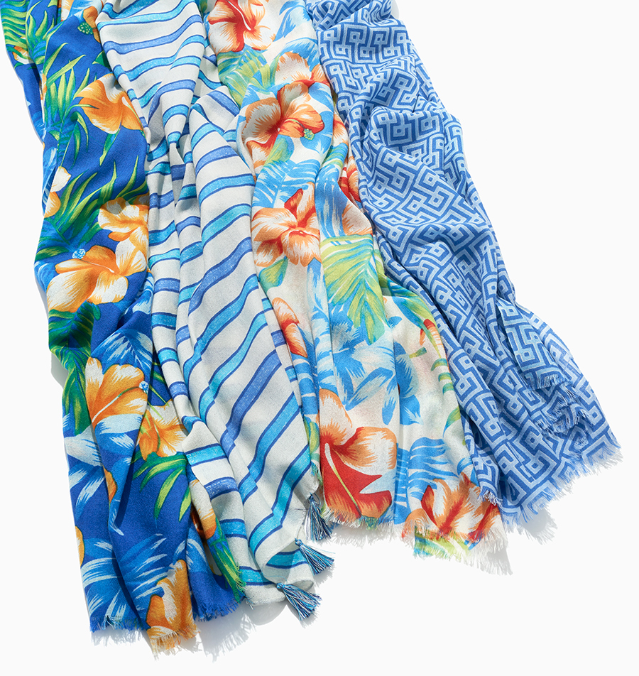 tropical colored scarves on white background by Alison Gootee Photography 