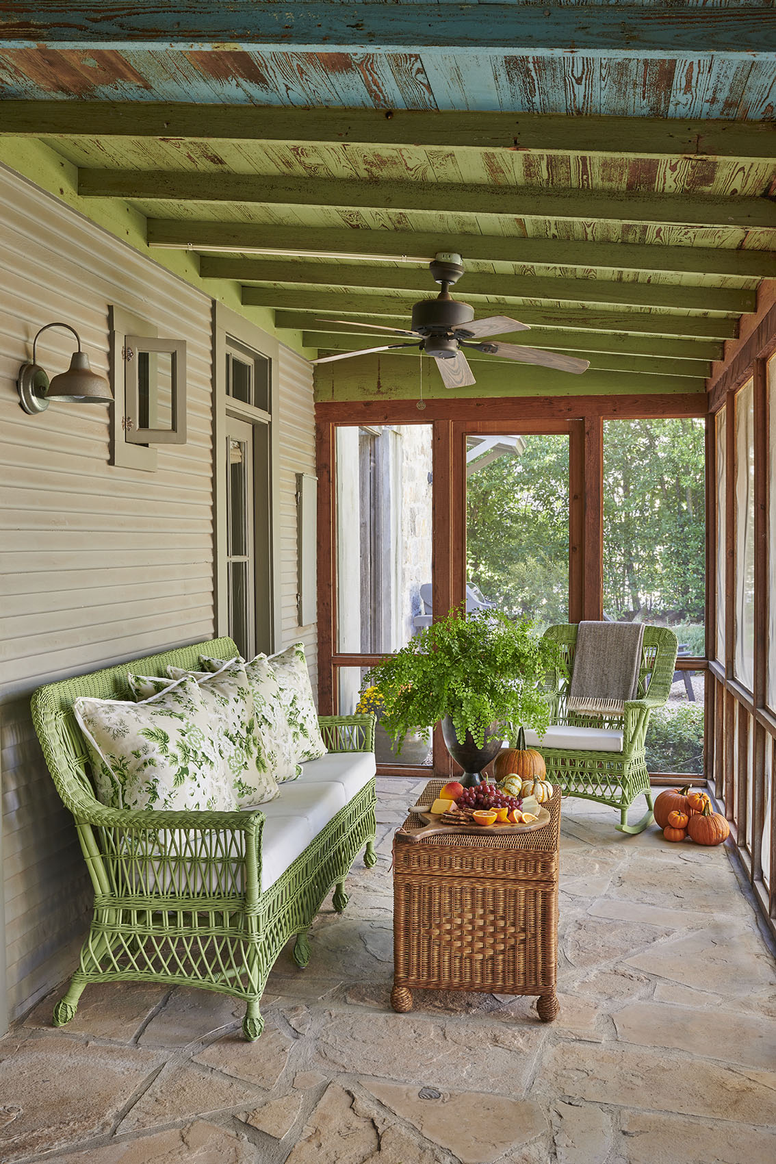 Green porch with wicker loveseat in Southern Living Magazine in Fredericksburg Texas by Alison Gootee Photography