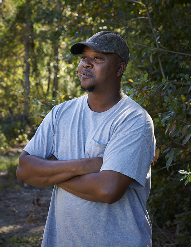Black Farmer with toothpick by Alison Gootee Photography