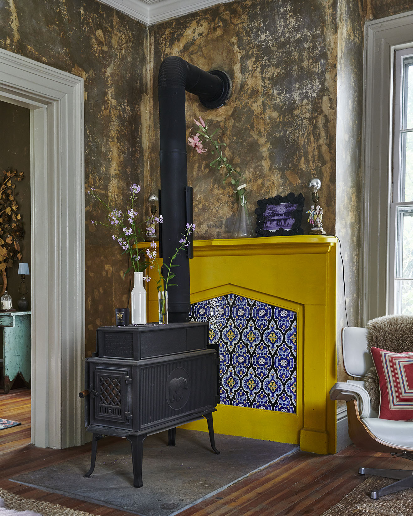 wood burning stove in yellow room in MartinBourne Home by Alison Gootee Photography