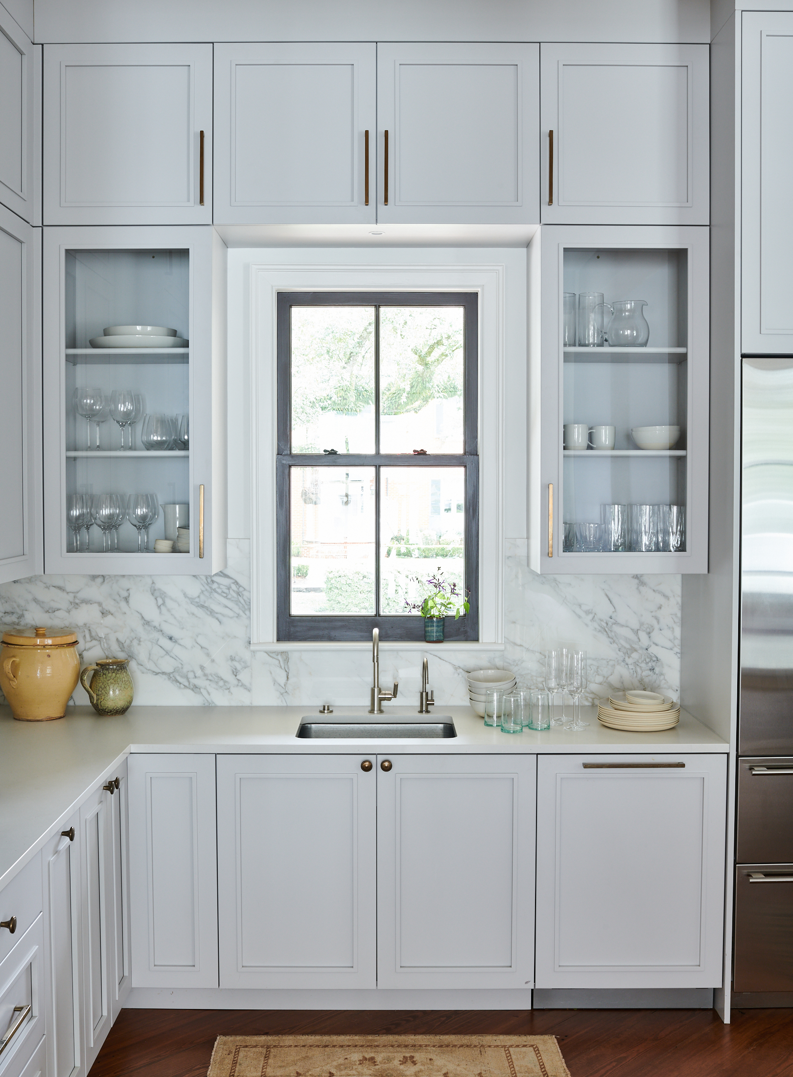 kitchen sink with window above it by Alison Gootee Photography for Logan Killen Interiors 