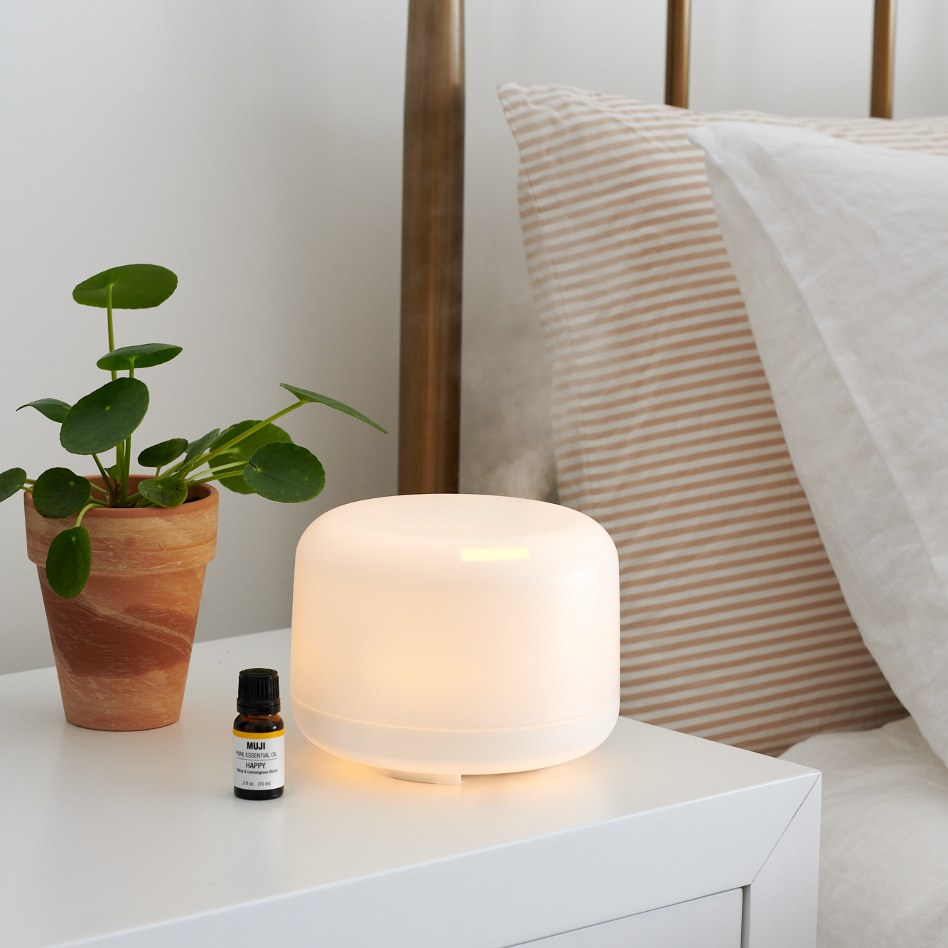 Air bnb and muji bedside lightup humidifier  by Alison Gootee Photography