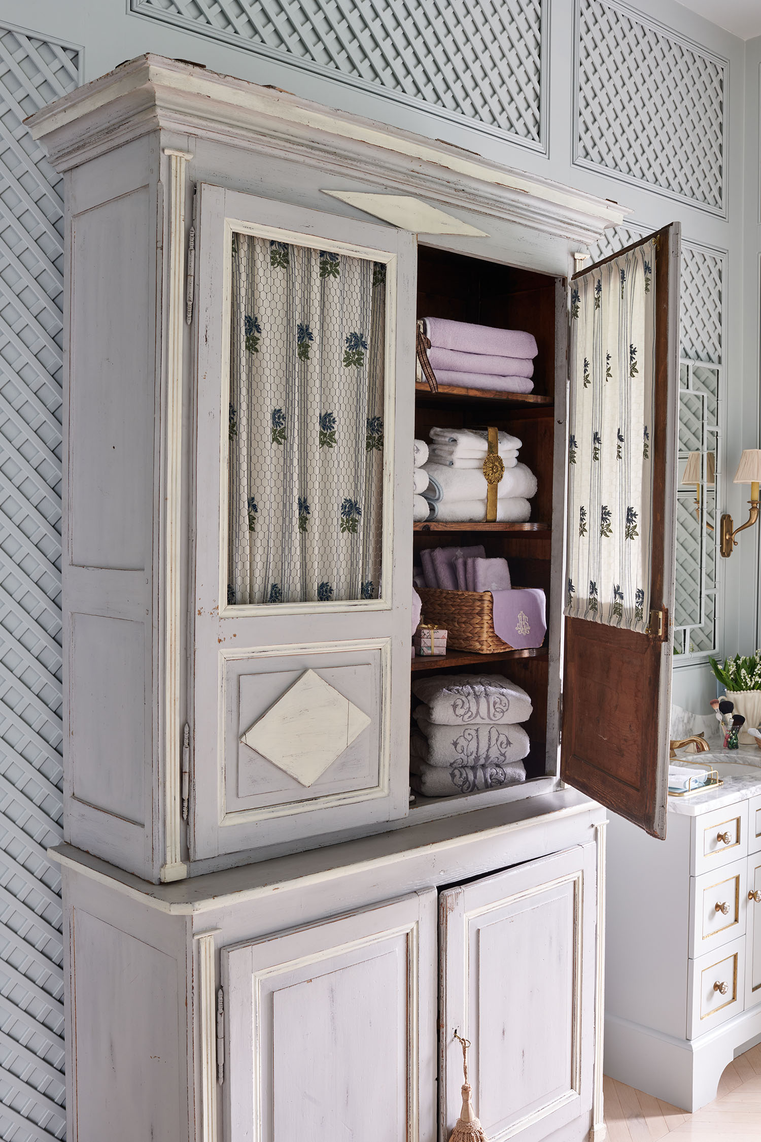 Linen cabinet of Jane Scott Hodges in New Orleans Home for Veranda Magazine by Alison Gootee Photography