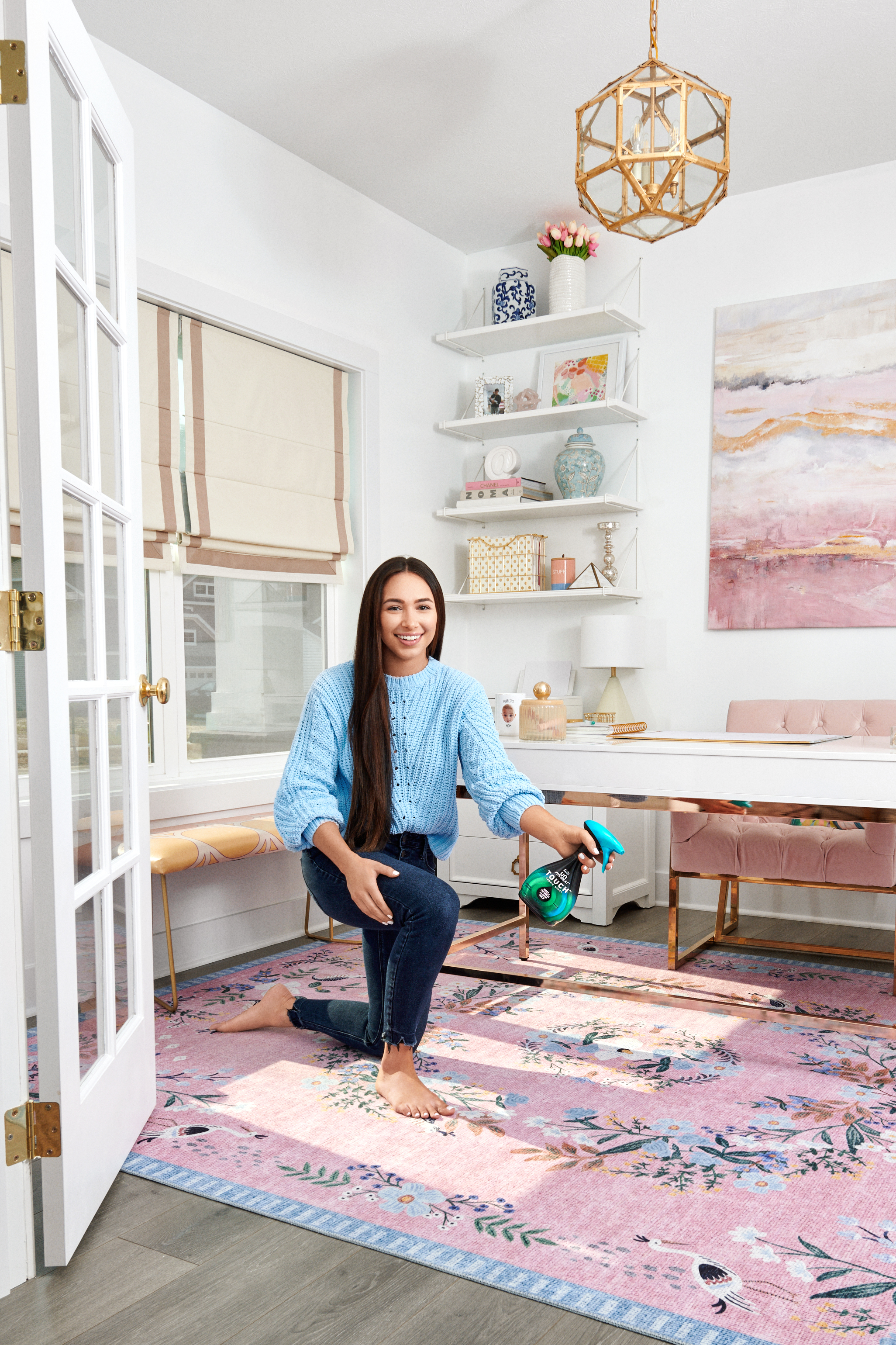  Woman spraying Febreeze on a rug for Real Simple by Alison Gootee Photography