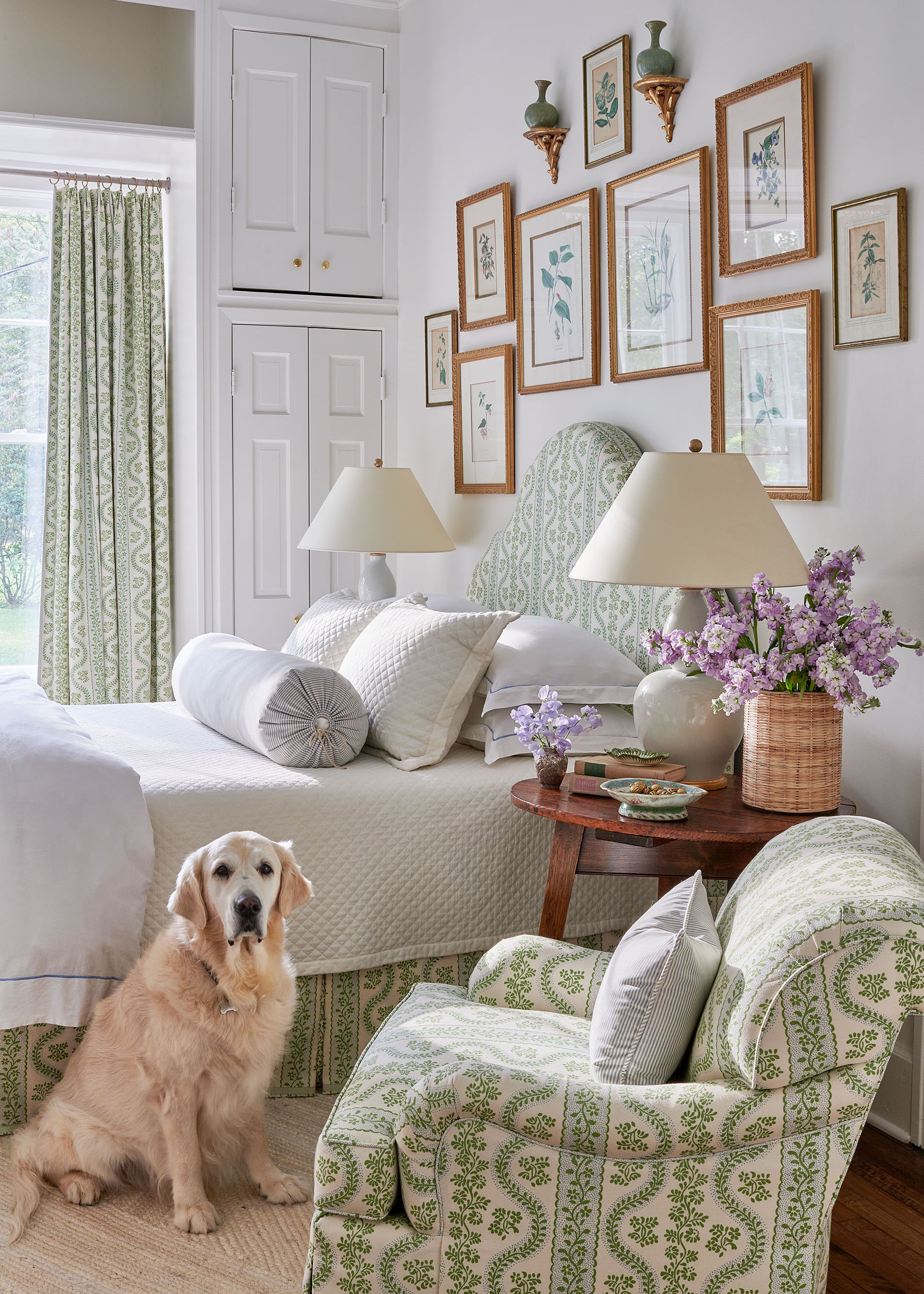 Dog sitting in front of bed  in Arkansas Home by Heather Chadduck in Veranda Magazine by Alison Gootee photography