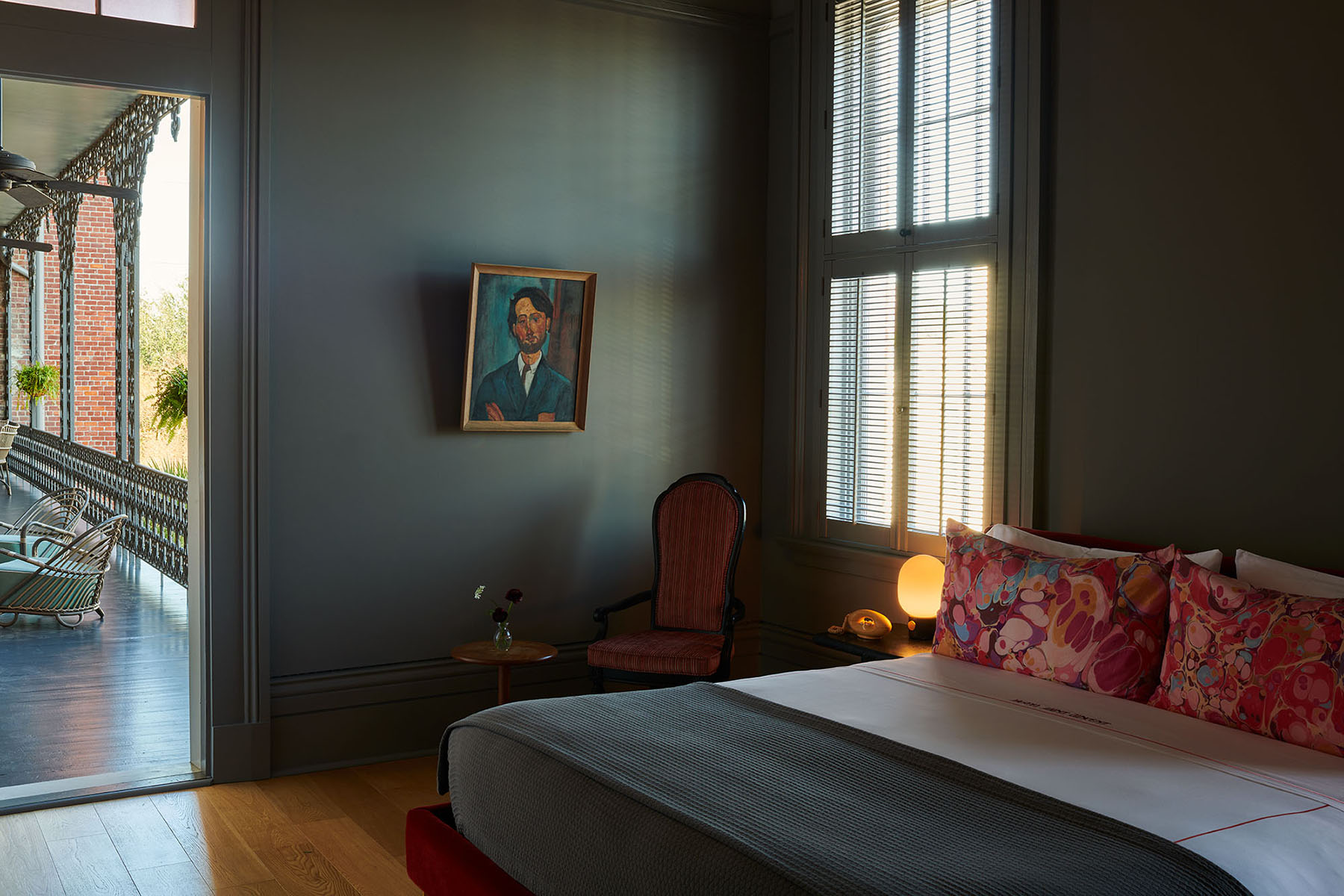 Grey guest bedroom with balcony in Hotel St.Vincent in New Orleans by Alison Gootee photography