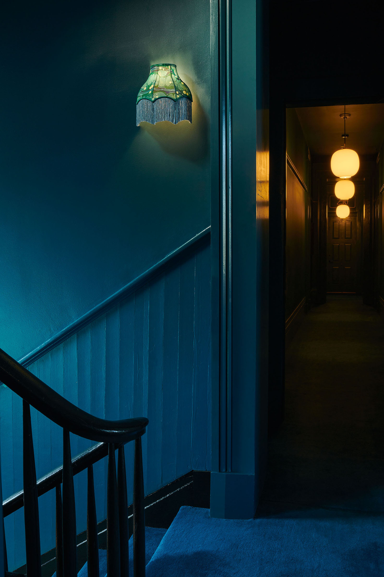 Moody blue hallway in Hotel St.Vincent in New Orleans by Alison Gootee photography