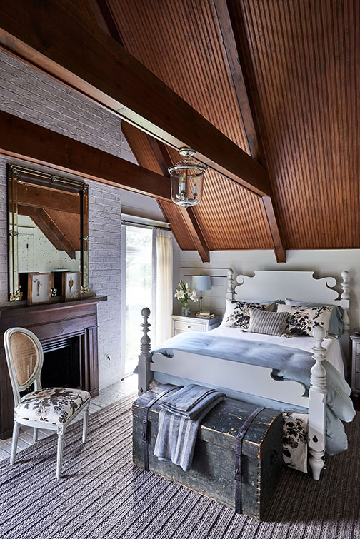 Bedroom with vaulted ceilings by Marie Flanigan Interiors in Southern Living Magazine in Brenham Texas by Alison Gootee Photography