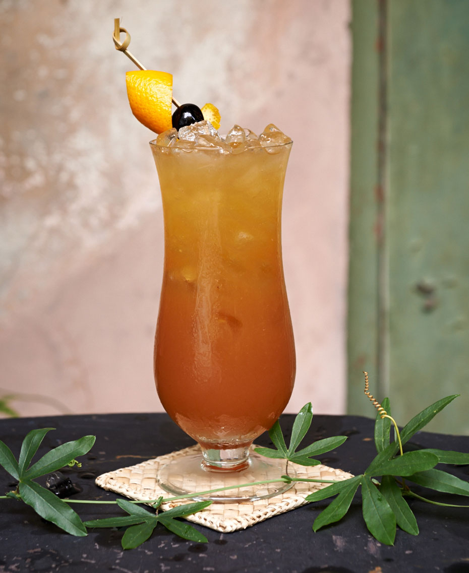 New Orleans Hurricane cocktail in French Quarter cocktail is food photography by Alison Gootee Photography