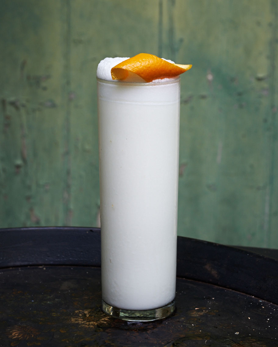 gin fizz cocktails in new orleans courtyard is food photography by Alison Gootee Photography