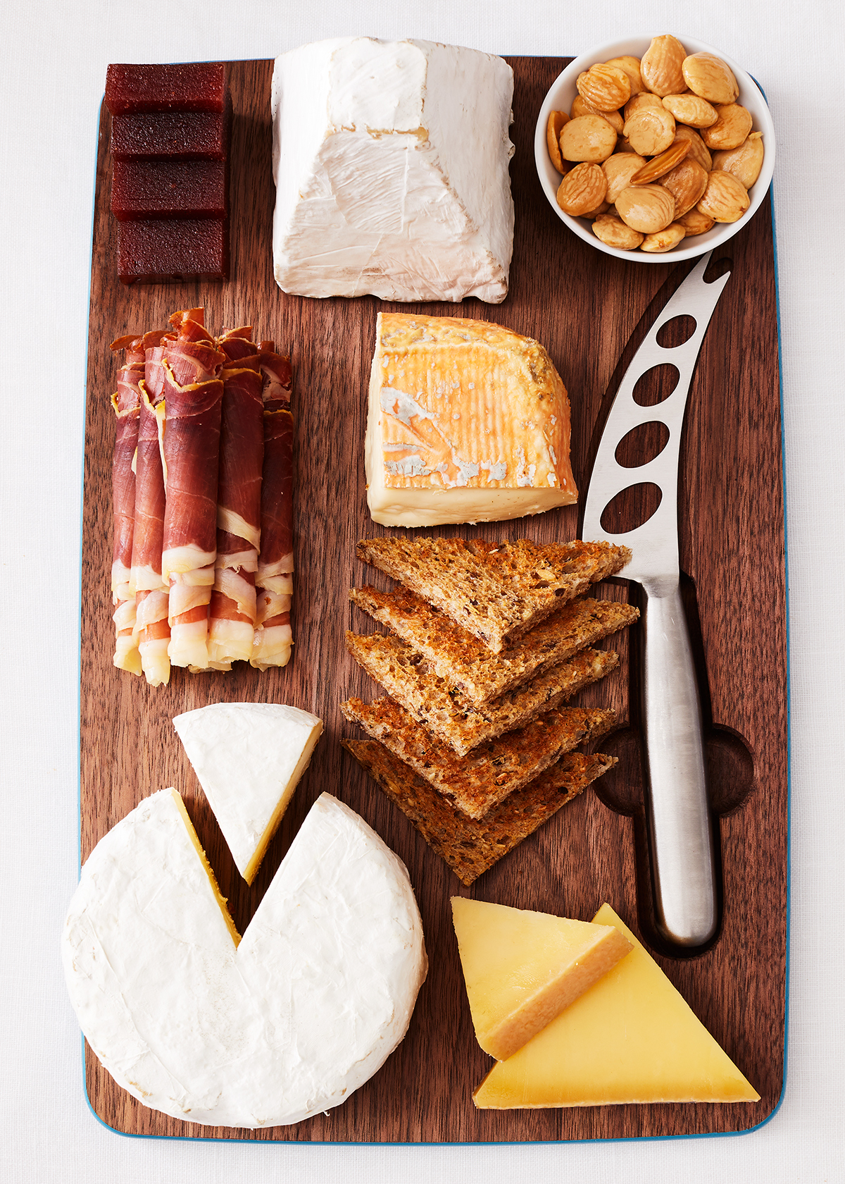Cheeseboard with brie cheese and procuitto meat is food photography by Alison Gootee Photography