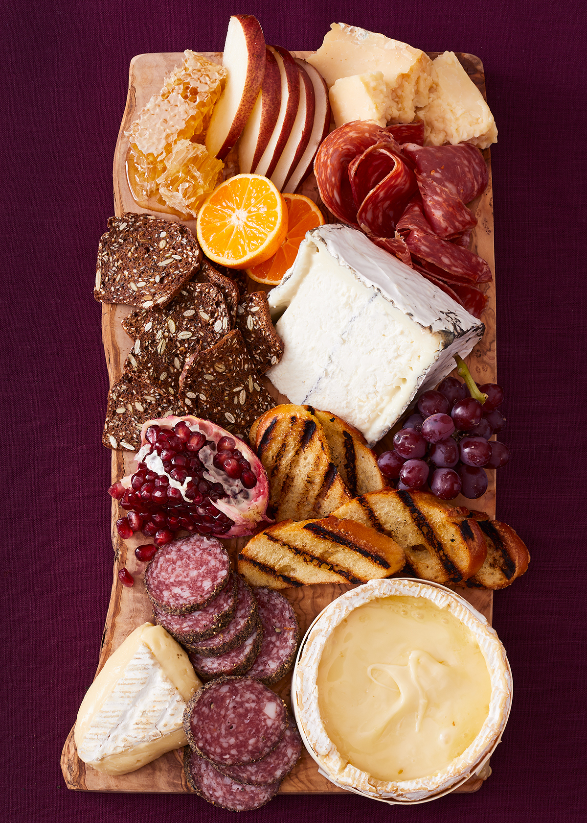 Cheeseplate with rustic breads and bites is food photography by Alison Gootee Photography