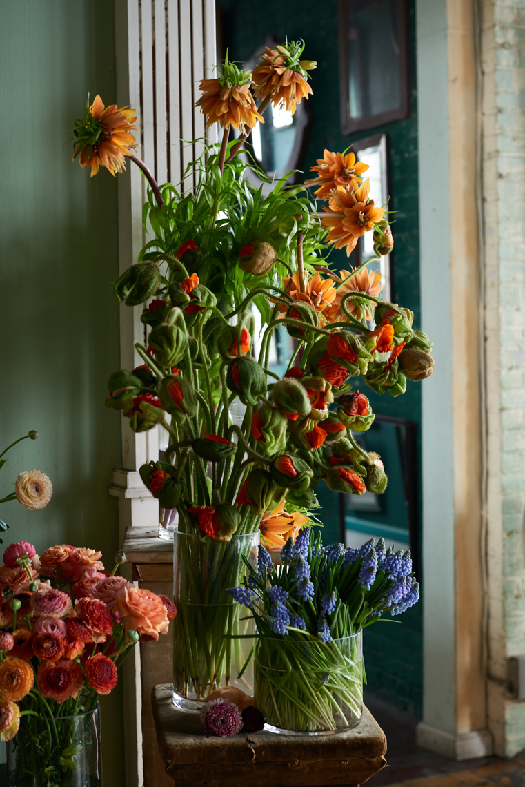 Tall floral arrangement in an industrial space Still-life by Alison Gootee Photography