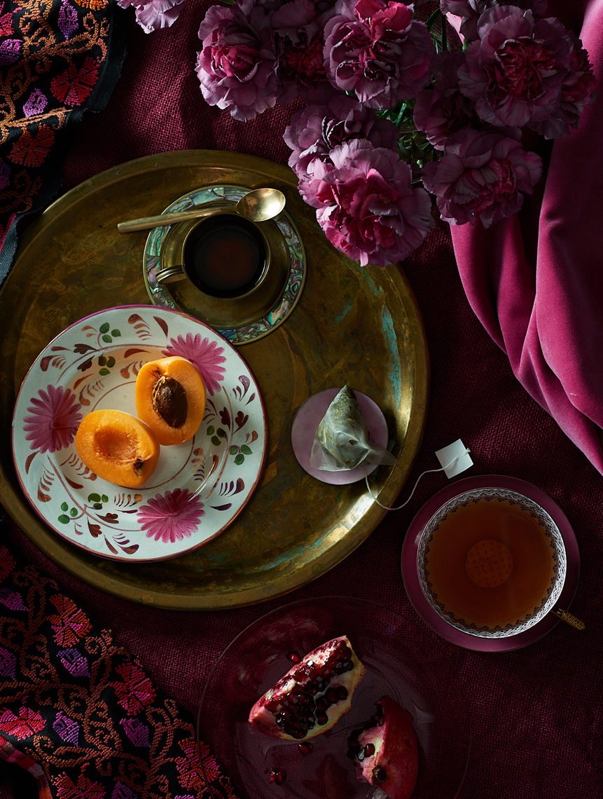 moody table top with apricots teacup and pink velvet  Still-life by Alison Gootee Photography