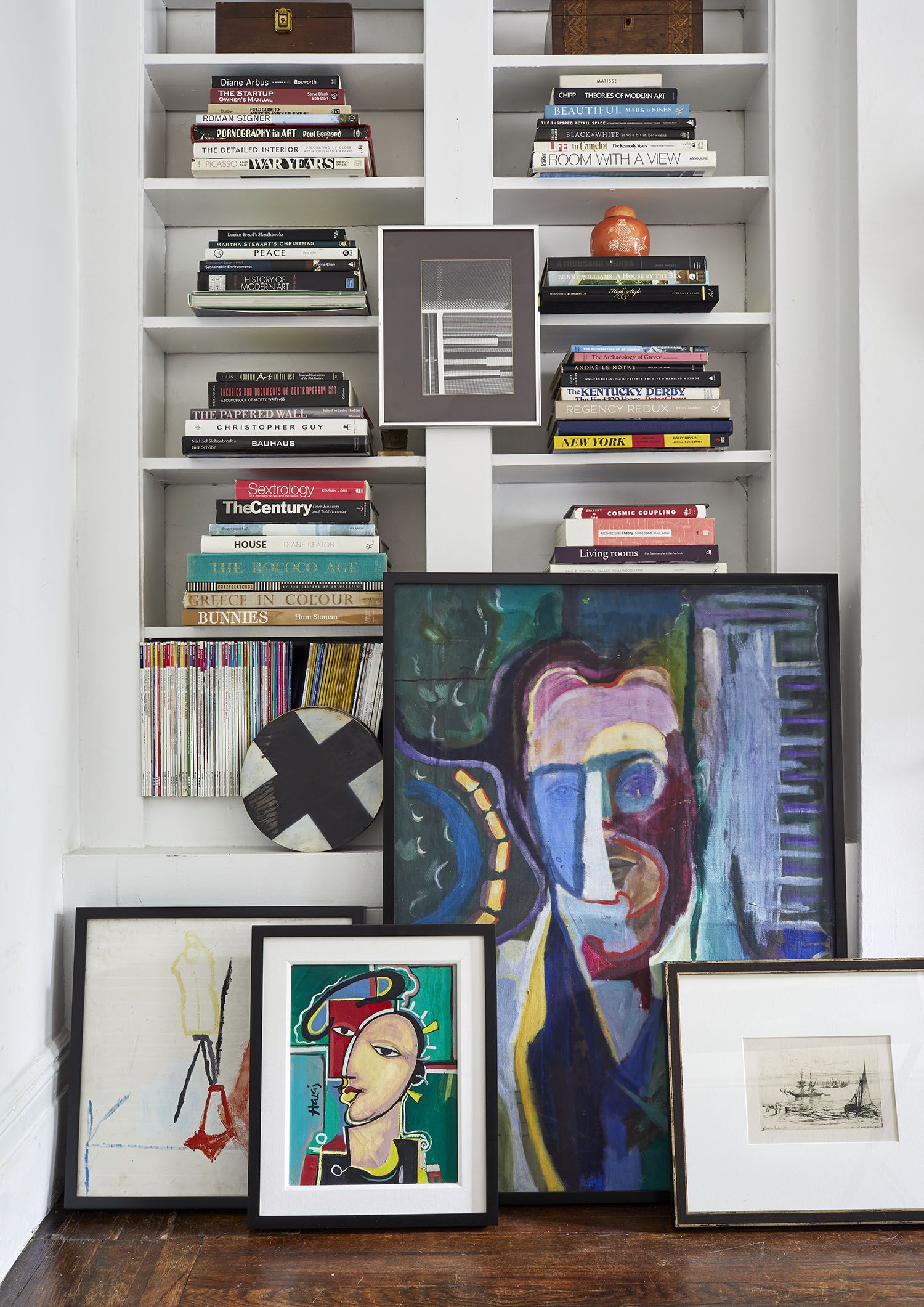 Book shelves and art for House Beautiful Magazine by Alison Gootee Photography 