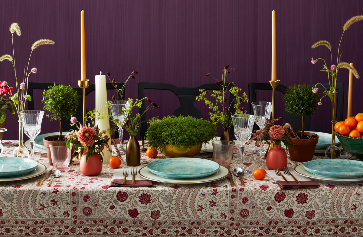 Horizontal tablescape with fall colors of orange and plum for House Beautiful Magazine  Still-life by Alison Gootee Photography