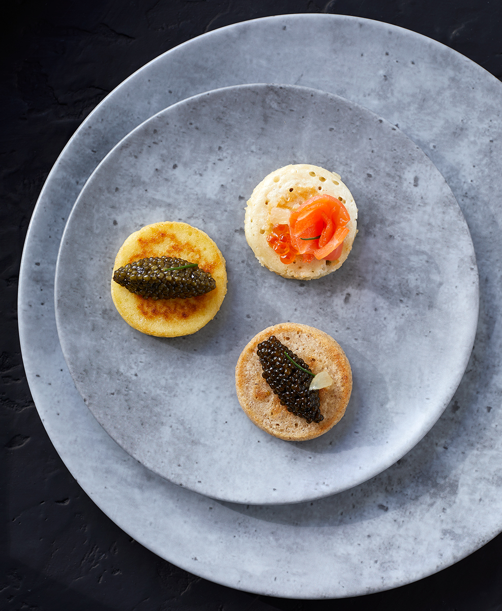 Selection of caviar on blintzs is food photography by Alison Gootee Photography