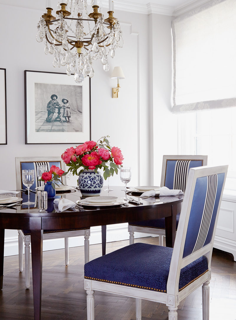 House beautiful formal dining table with blue velvet chairs by Alison Gootee Photography