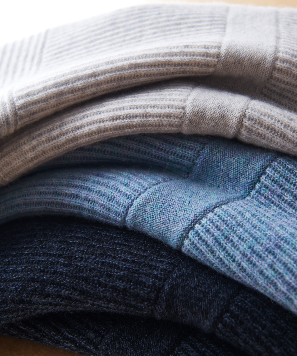 close up of stack of sweaters by Alison Gootee Photography 