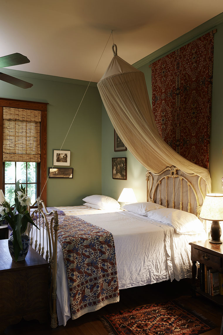 Mosquito net over Cajun bed by Alison Gootee Photography