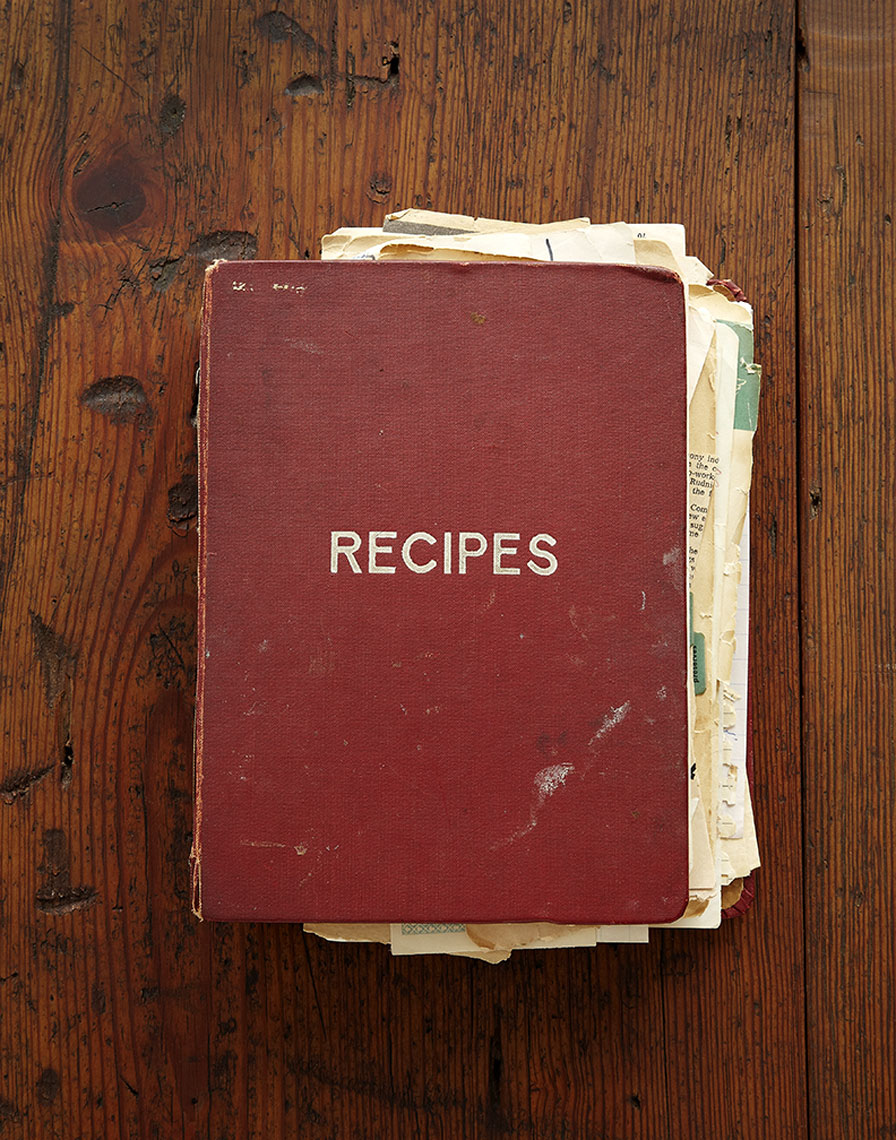 Vintage cookbook on wooden surface Still-life by Alison Gootee Photography