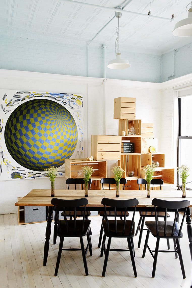 Large globe painting with dining room table by Alison Gootee Photography