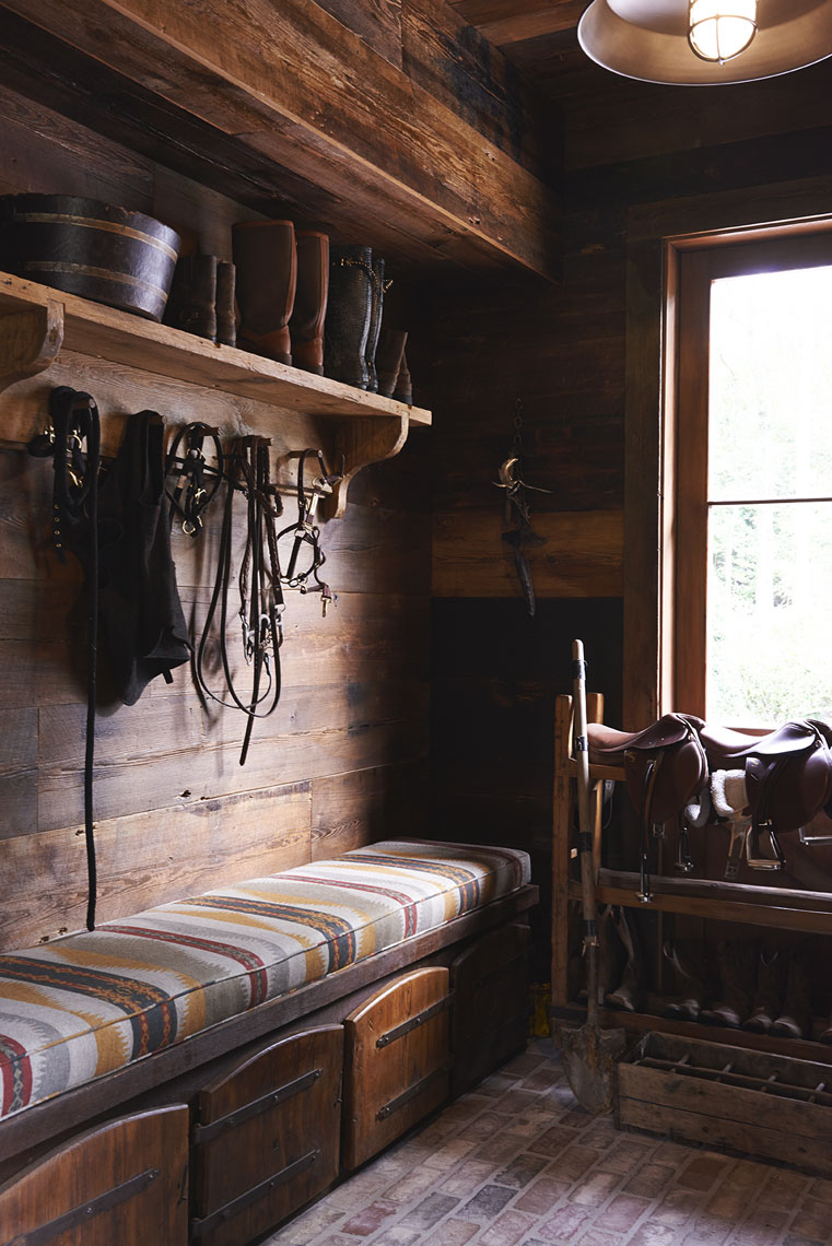 Wooden tack room at Talisheek Pearl River Camp by Melissa Rufty  in Garden and Gun Magazine by Alison Gootee photography