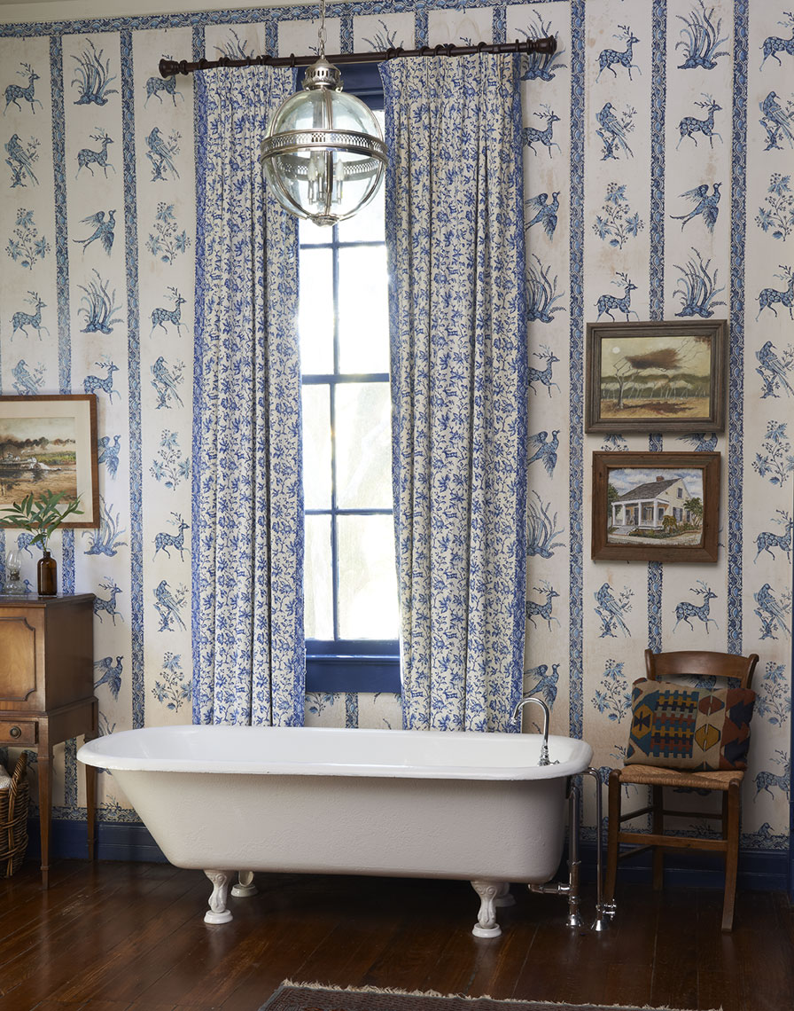 Claw foot tub in old house by Alison Gootee Photography 