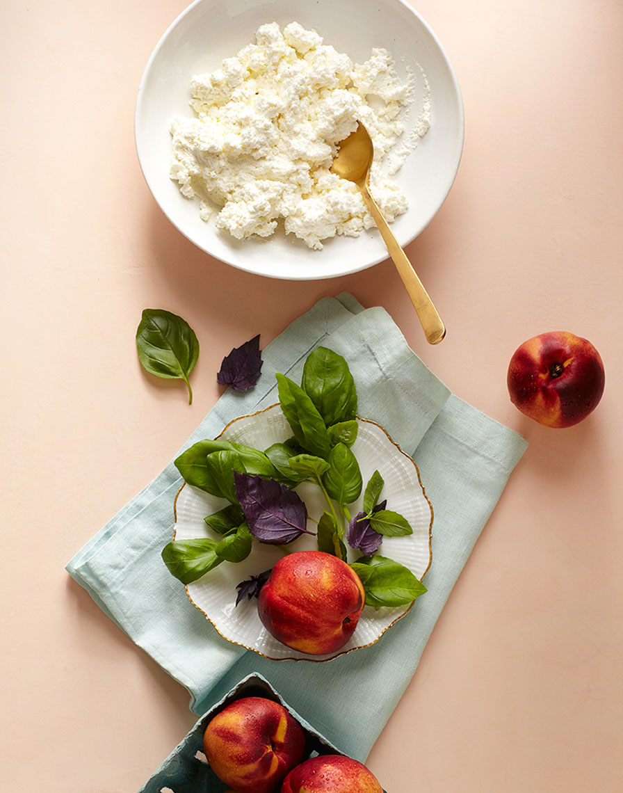 Nectarine and burrata ingrdients on pink is food photography by Alison Gootee Photography