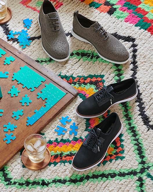 sneakers on moroccan rug with puzzle by Alison Gootee Photography 