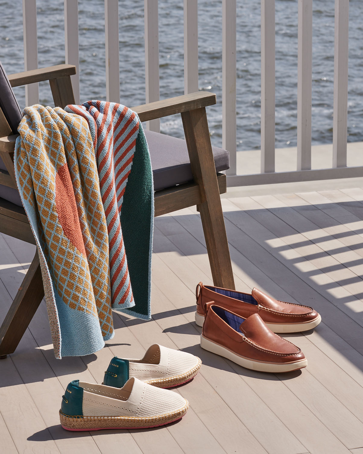 Boat shoes on lake deck by  Alison Gootee Photography