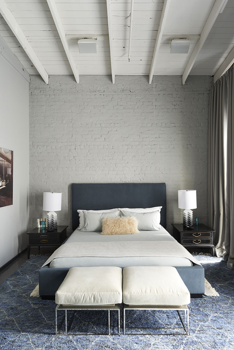 moody simple bedroom in New Orleans loft apartment by Alison Gootee